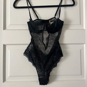 One-piece black lacy lingerie